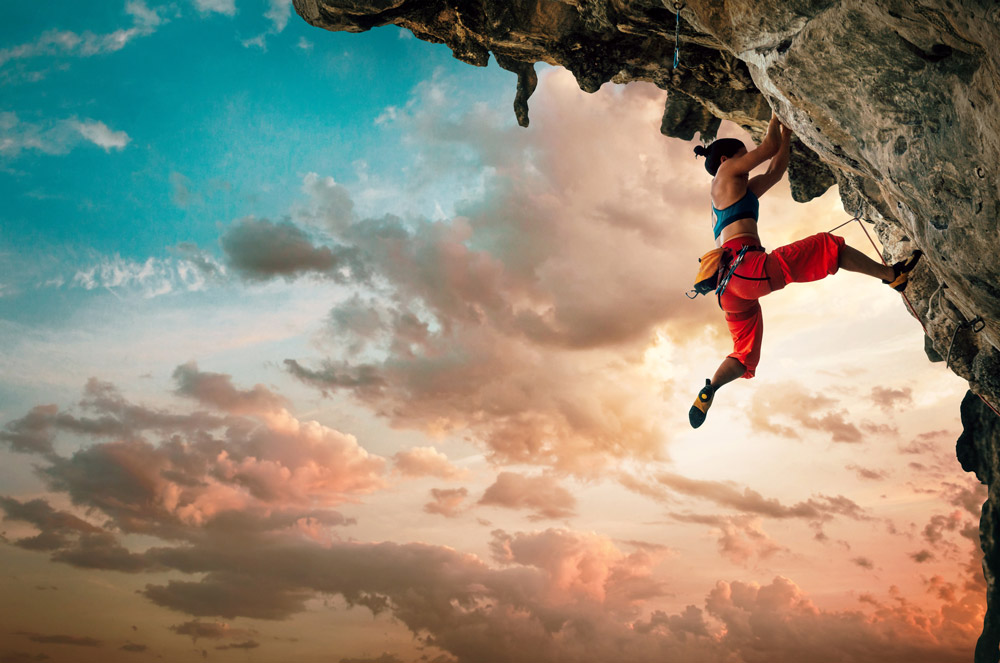 Woman rock climbing